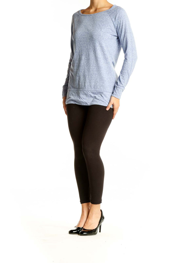 Front view of light blue Eddie Bauer long sleeve top on model