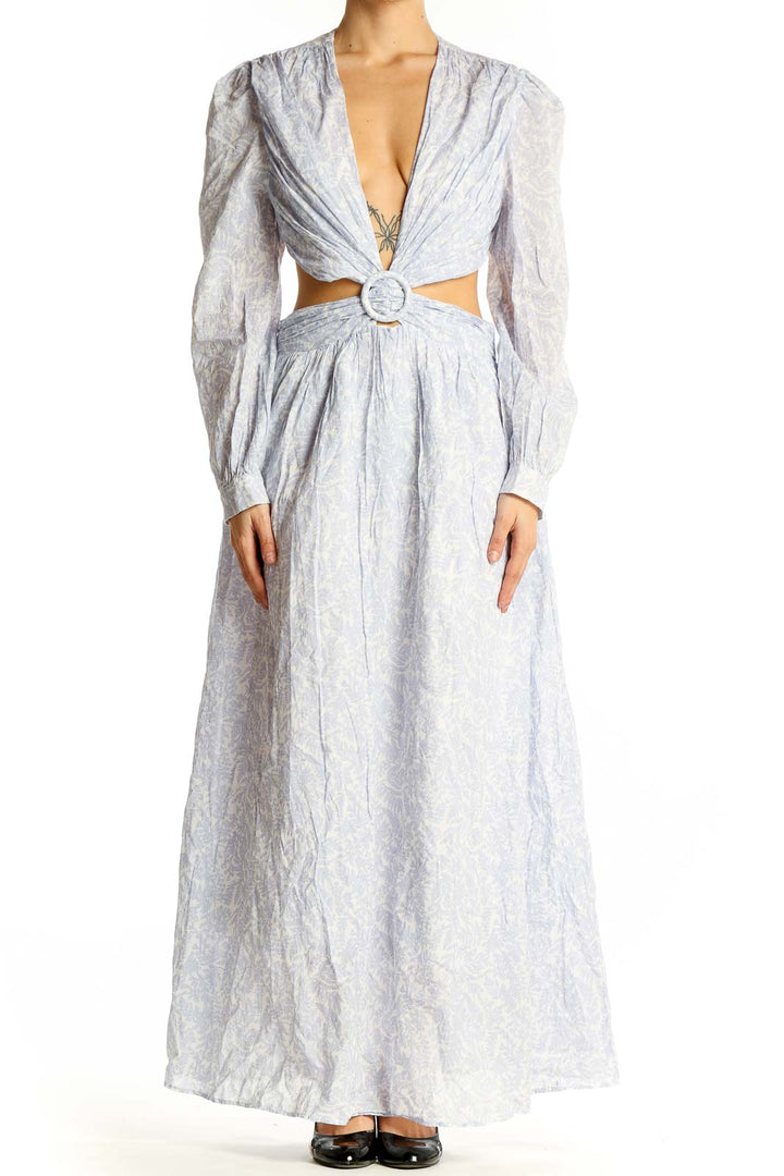 Front view of light blue floral cotton maxi dress with plunging neckline and cutout waist