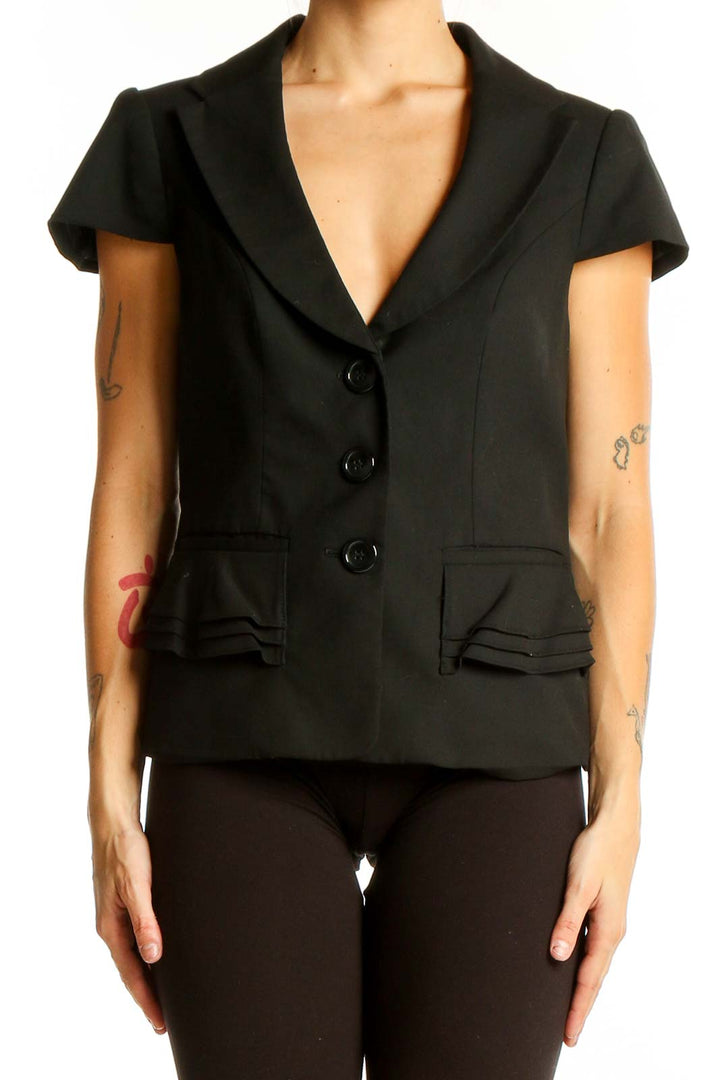 Front view of black short-sleeve blazer from The Limited