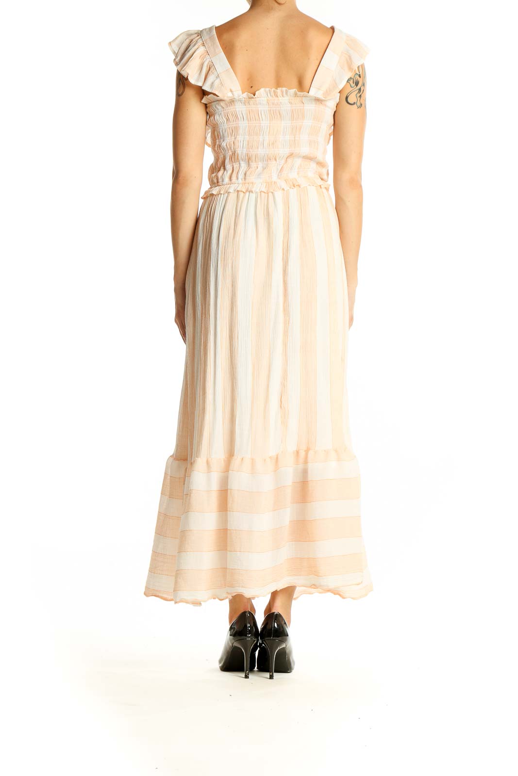 Back view of SilkRoll peach maxi dress showing full-length tiered skirt