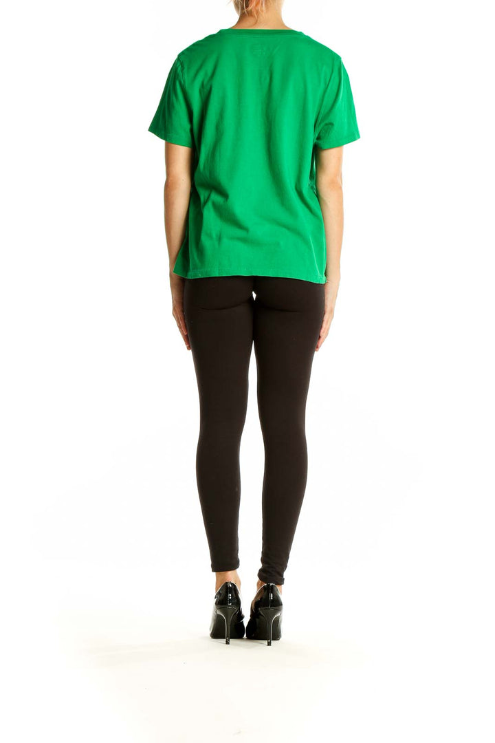 Side view of green J.Crew t-shirt showing relaxed fit