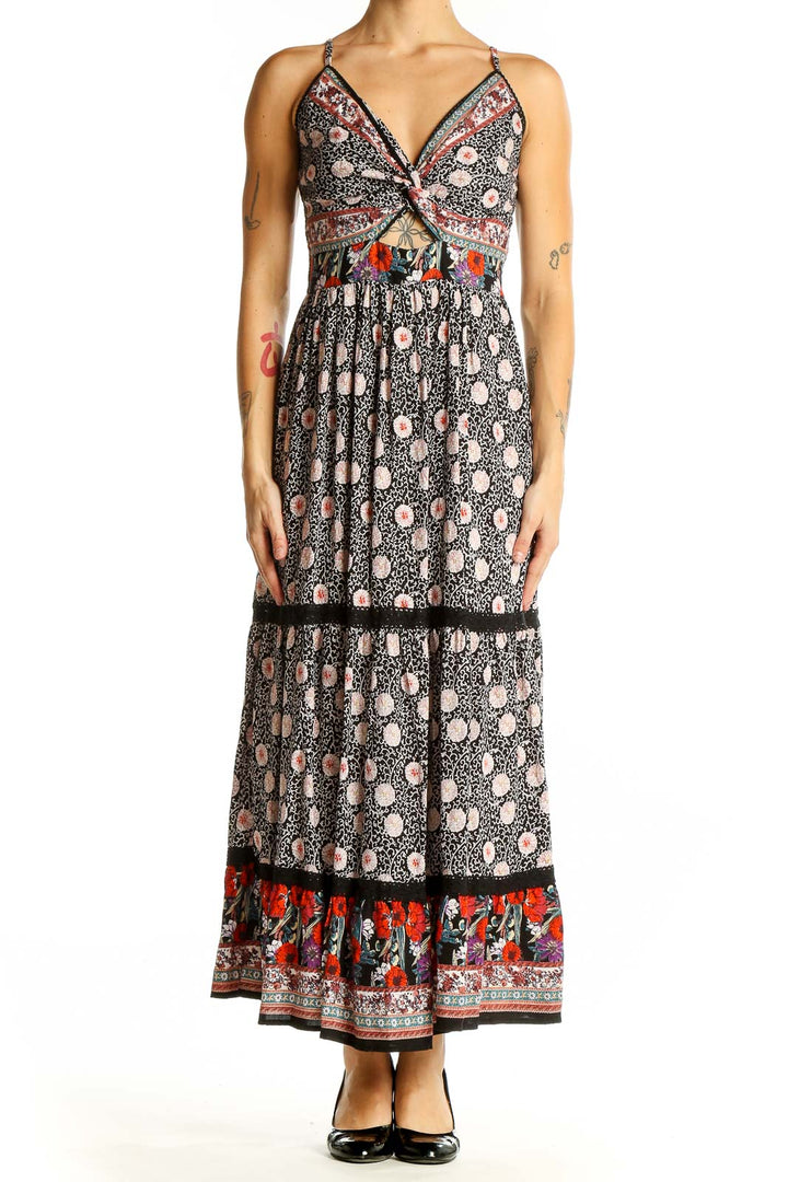 Front view of SilkRoll black floral print maxi dress with twist-front bodice