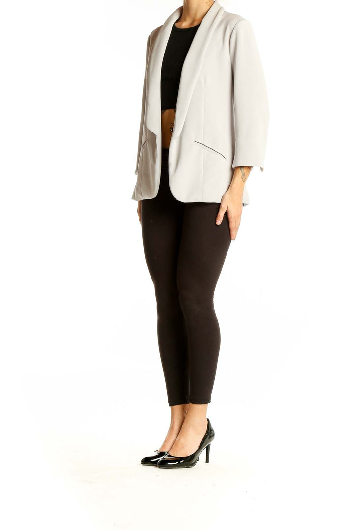 Front view of Skies Are Blue light gray open-front blazer with 3/4 sleeves