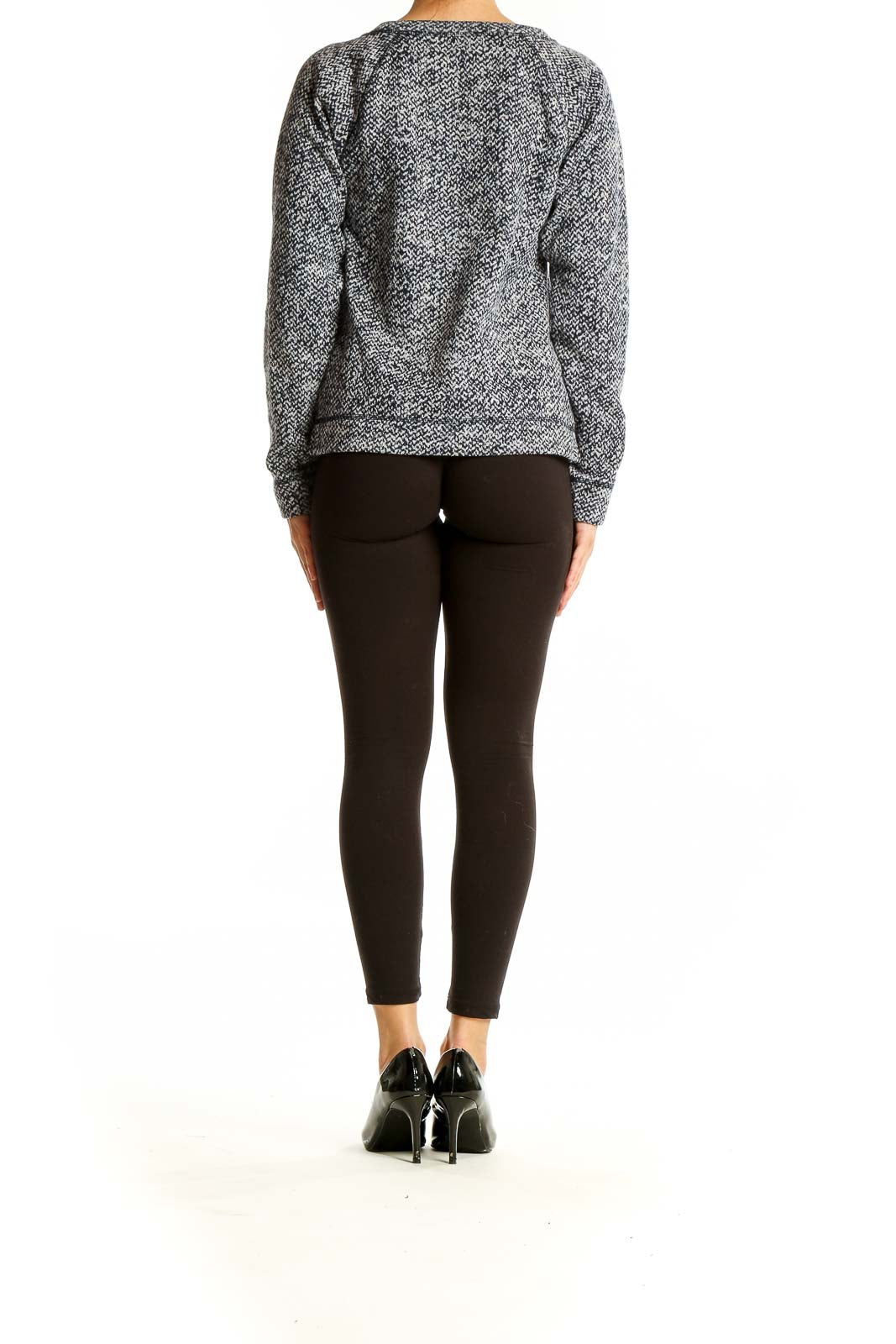 Back view of gray marled knit sweater from The Limited with black pants