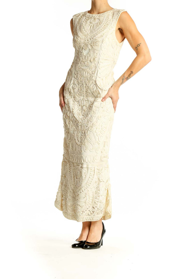 Front view of JS Collections ivory embroidered lace maxi dress with mermaid silhouette