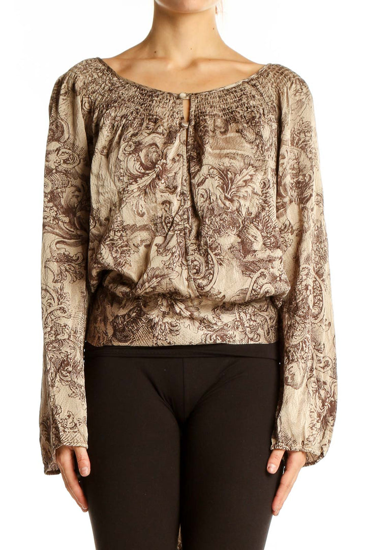 Front view of BCBG MaxAzria beige silk peasant blouse with brown floral pattern