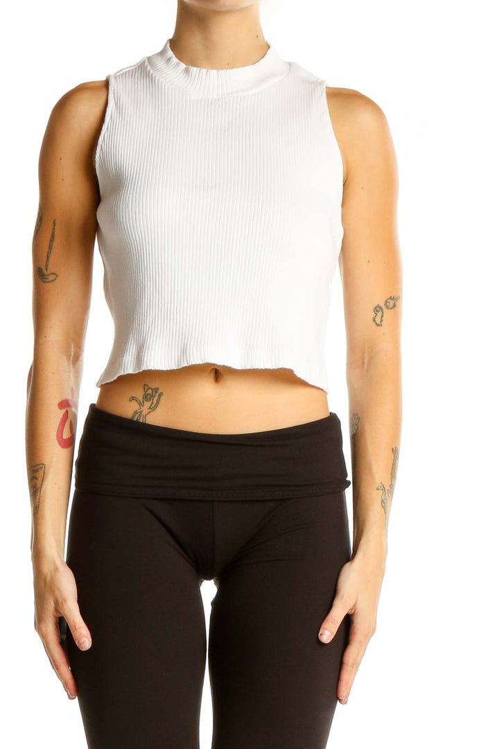 Front view of Uniqlo white ribbed crop tank top on model