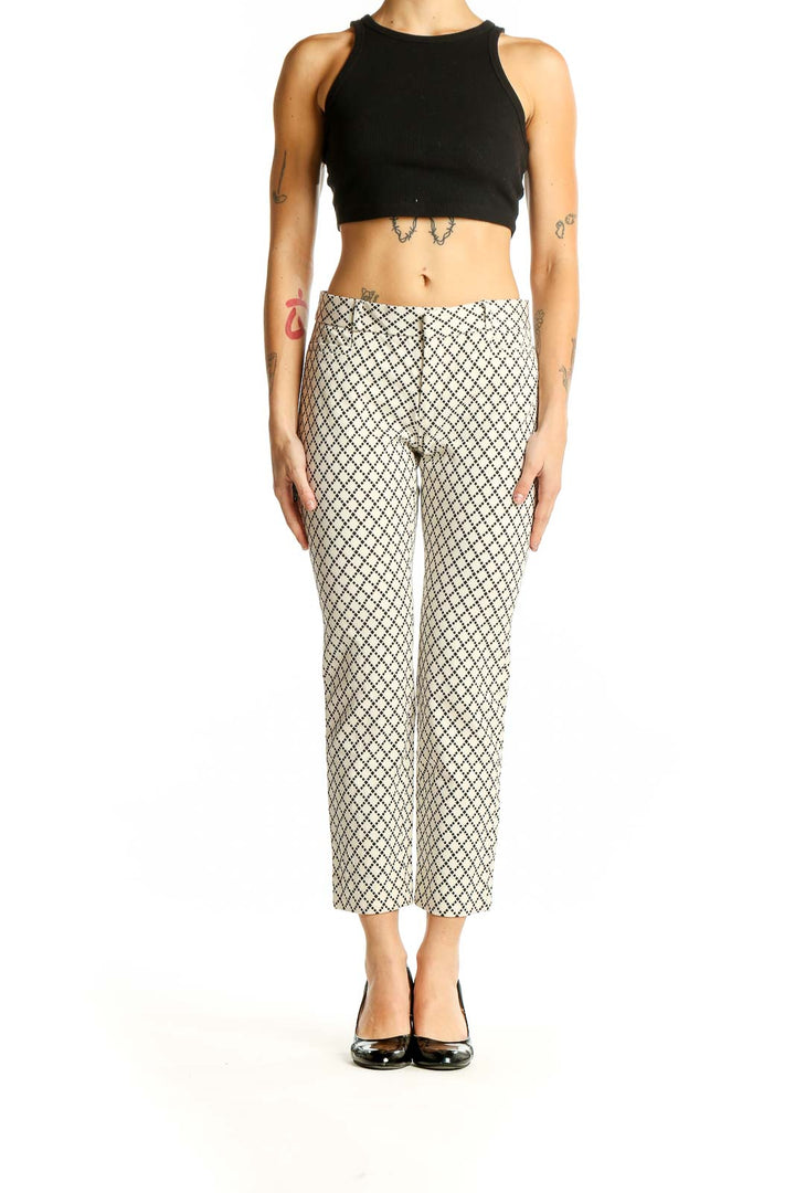 Front view of Banana Republic cream geometric print cropped pants on model