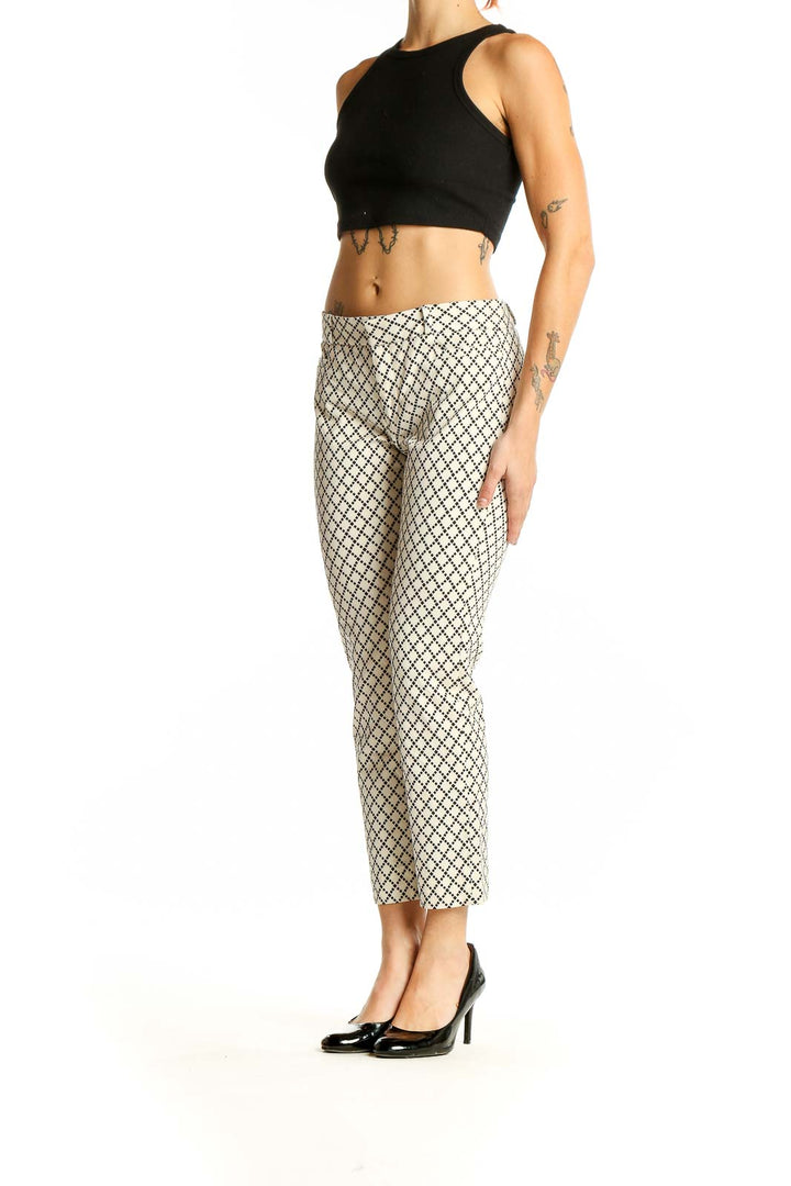 Front view of Banana Republic cream geometric print cropped pants on model