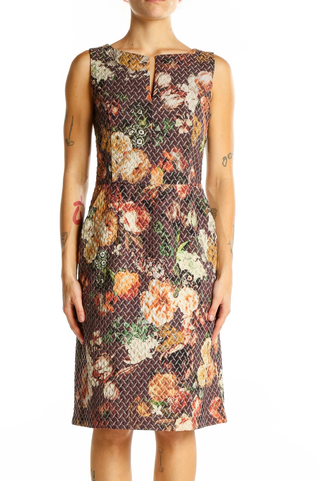 Front view of Tabitha brown floral sleeveless sheath dress with fitted silhouette