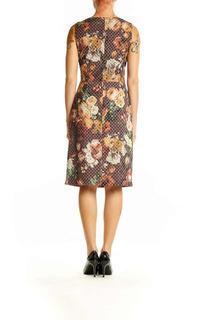 Back view of Tabitha brown floral sleeveless sheath dress showing all-over print