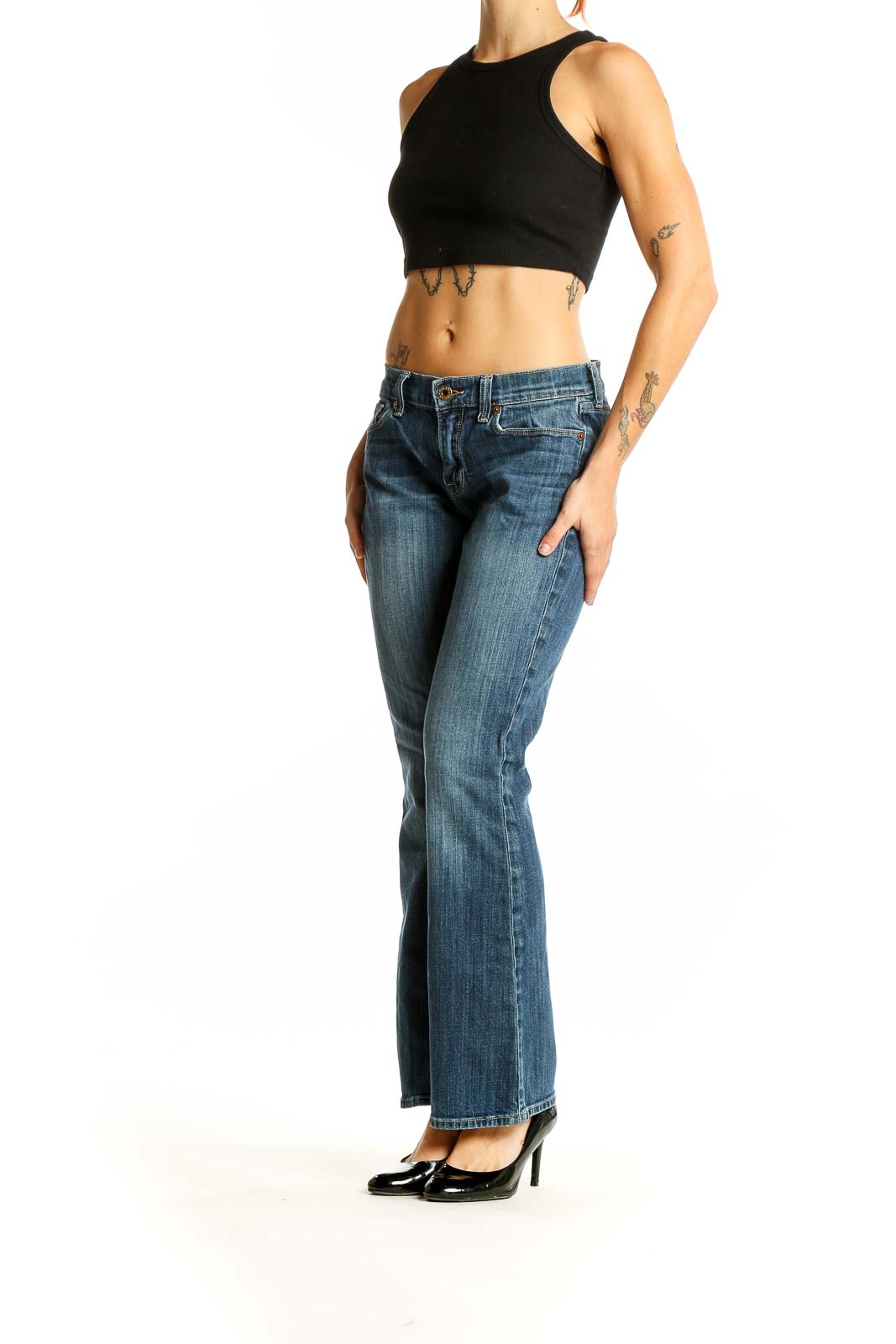 Front view of Lucky Brand blue bootcut jeans on woman