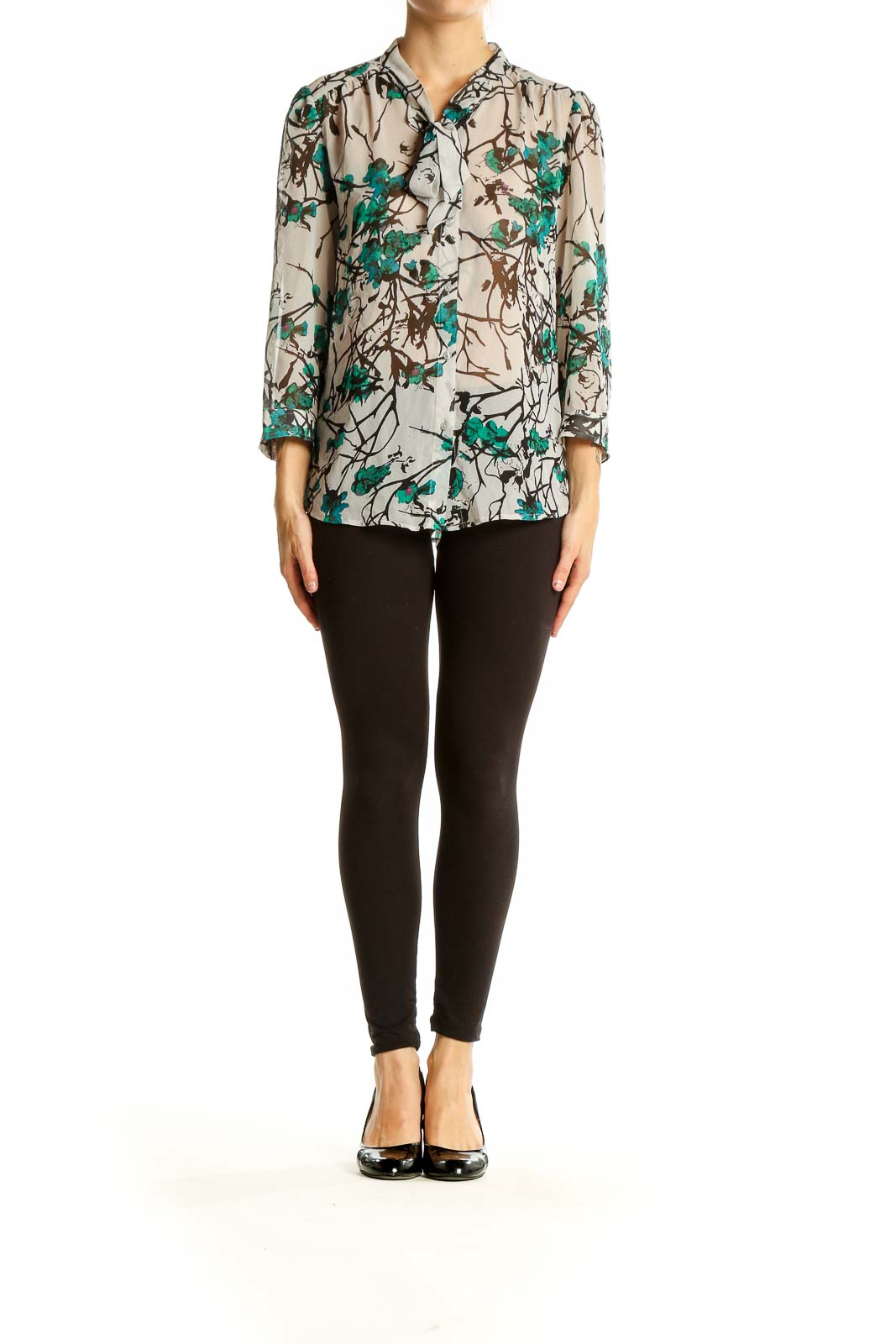 Front view of LOFT beige blouse with teal floral print and button-up design