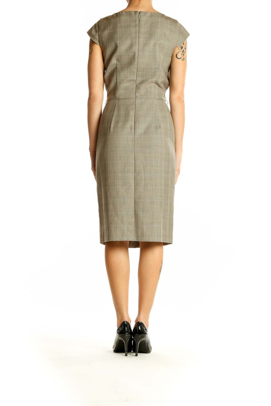 Side view of Calvin Klein taupe sheath dress showing fitted silhouette and knee-length cut