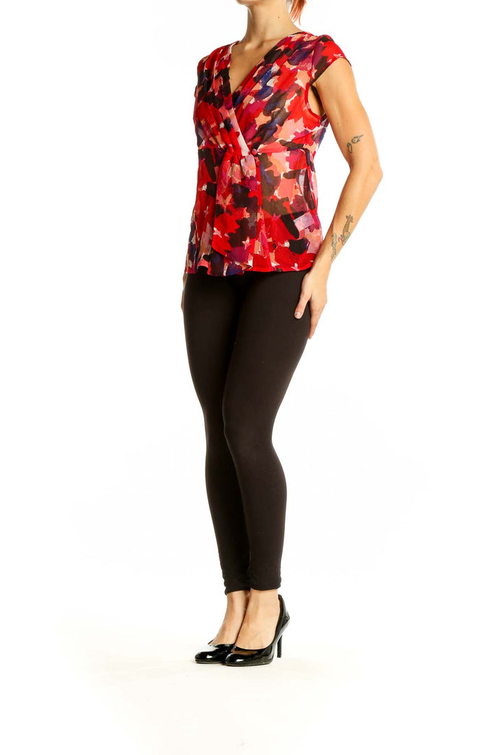 Front view of Banana Republic red floral print wrap-style blouse