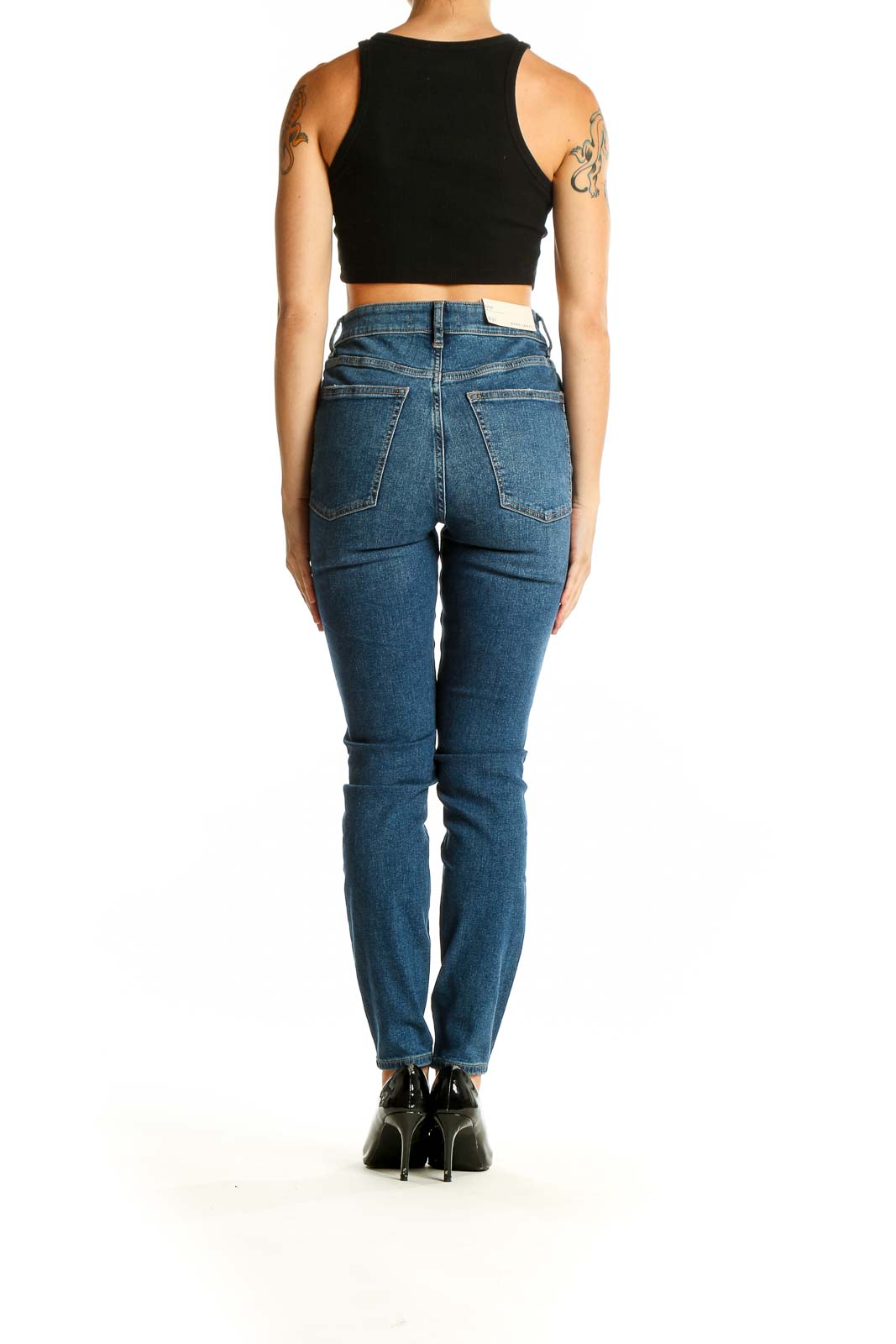 Back view of Warp Weft blue high-waisted slim fit jeans on model