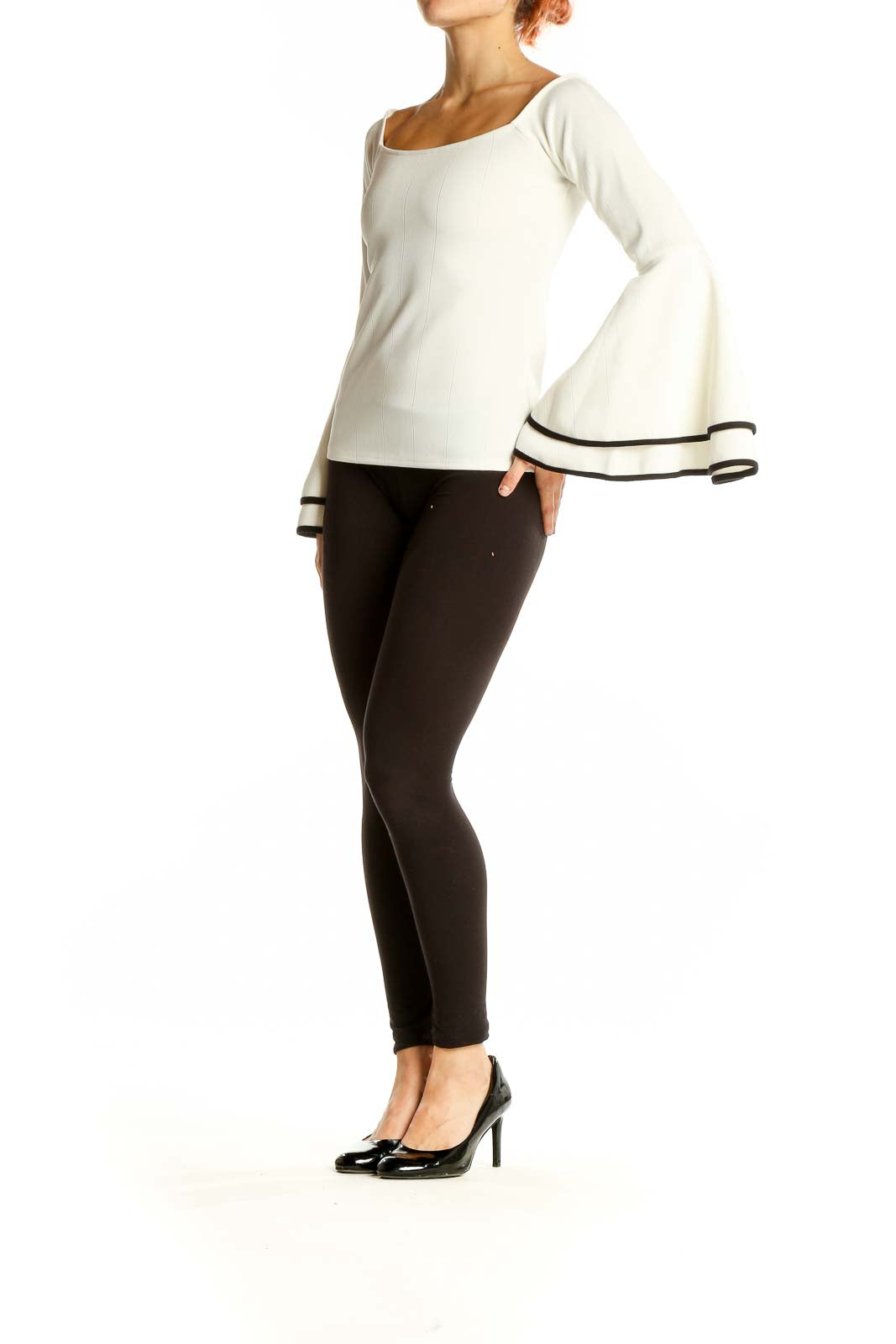 Front view of white bar III top with square neckline and bell sleeves