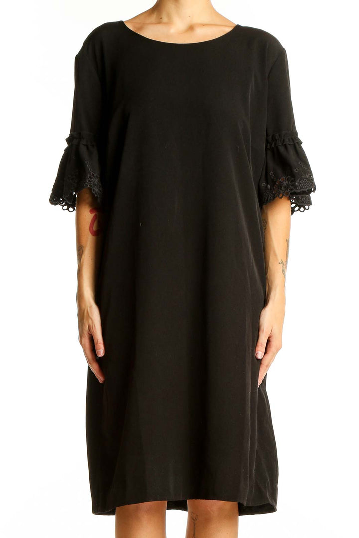 Front view of Karl Lagerfeld black shift dress with lace bell sleeves