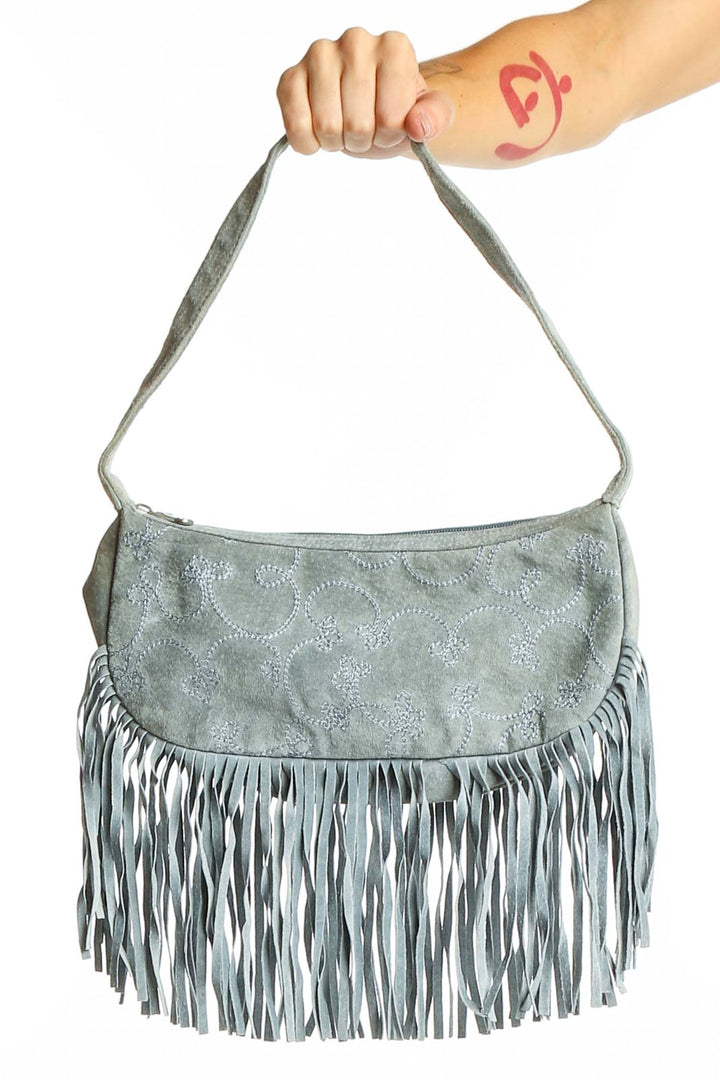 Front view of sage green suede fringed clutch by Wilsons Leather