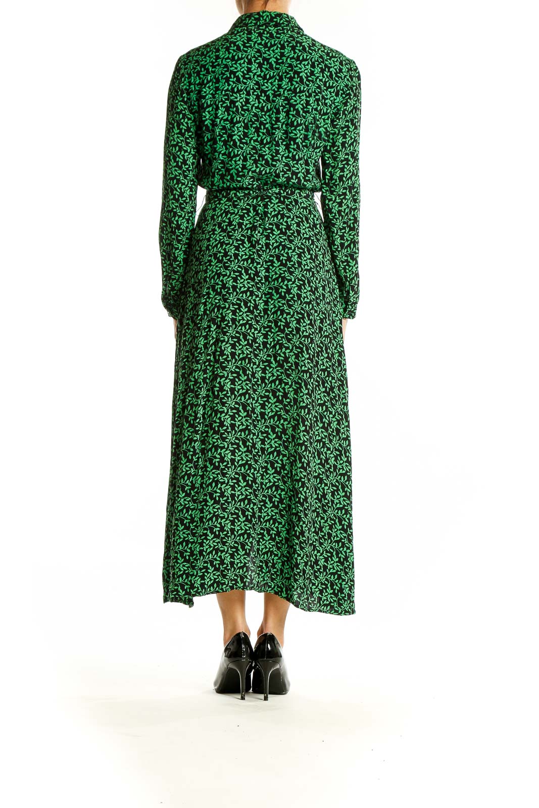 Side view of green floral print Zara maxi dress showing long sleeves and flowing silhouette