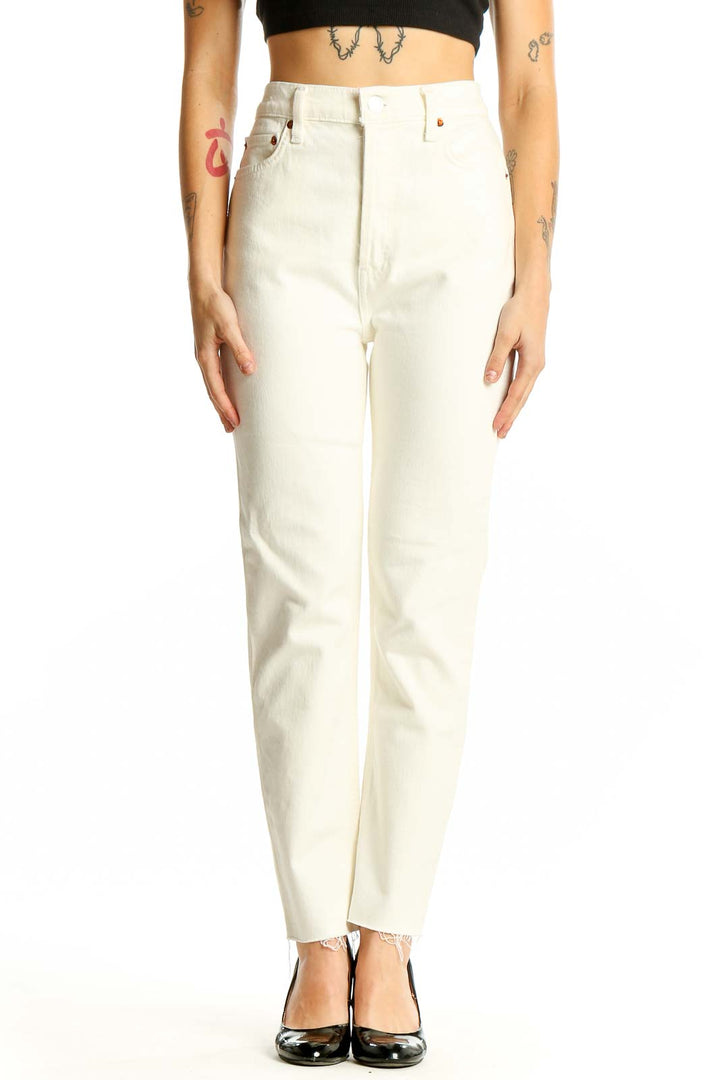 Front view of RE/DONE white high-waisted straight-leg jeans