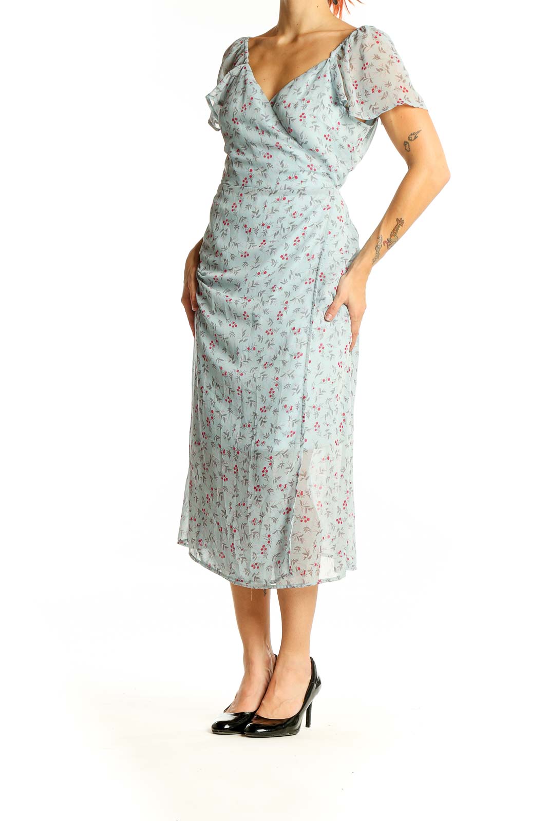 Front view of mint floral wrap midi dress with short sleeves