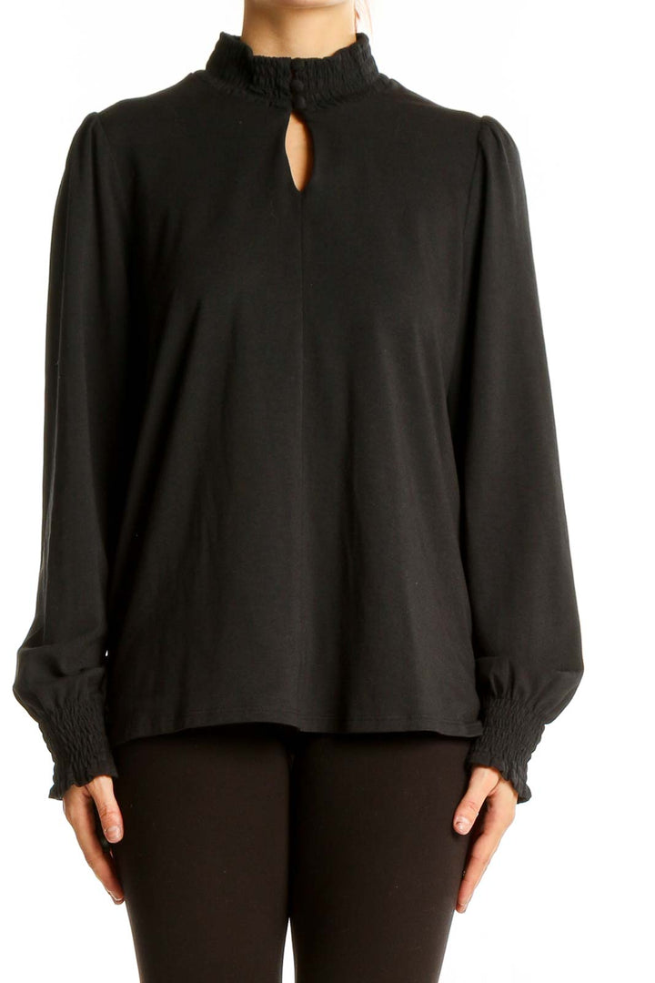 Front view of J.Jill black long-sleeve top with keyhole neckline