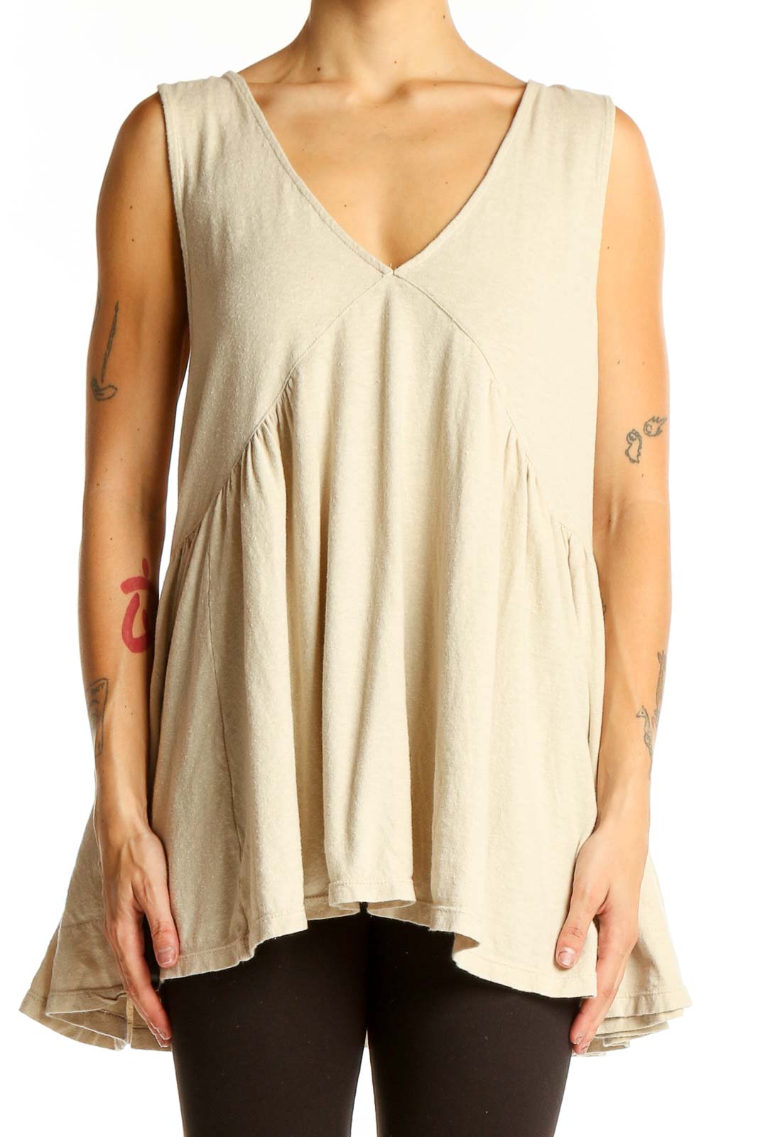 Front view of beige Free People Beach flowy V-neck sleeveless tunic