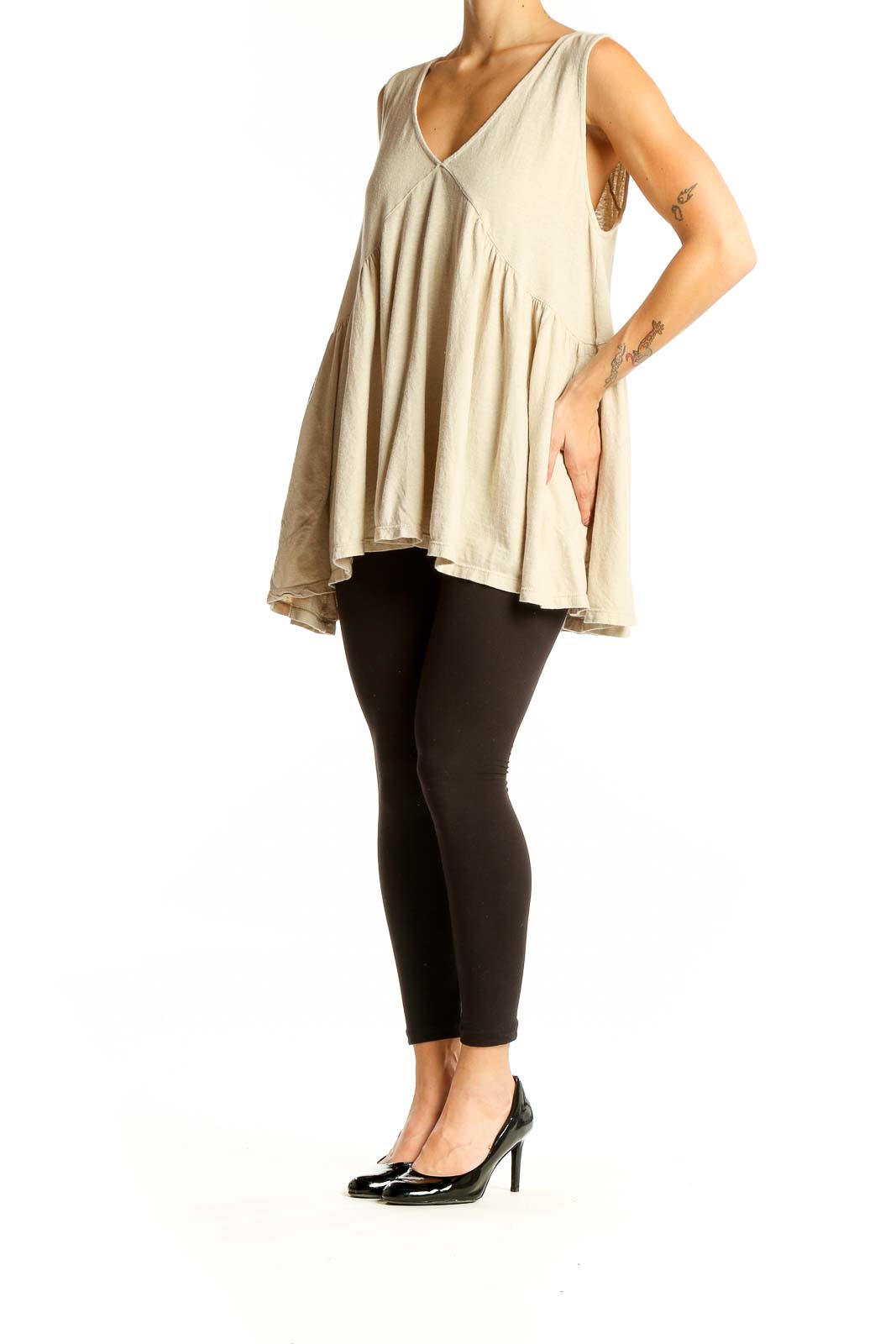 Front view of beige Free People Beach flowy V-neck sleeveless tunic