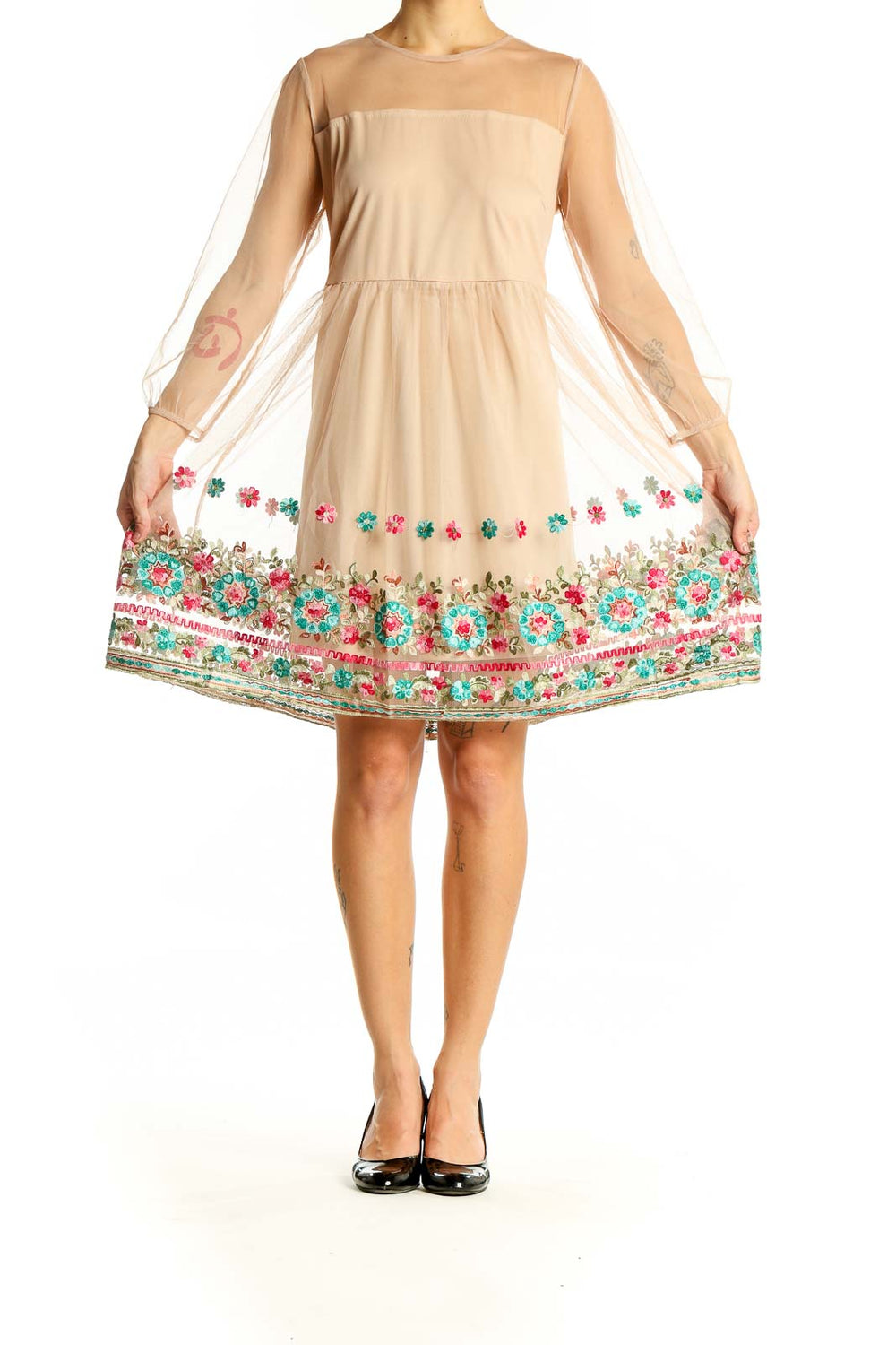 Front view of Entro beige dress with sheer overlay and floral embroidery