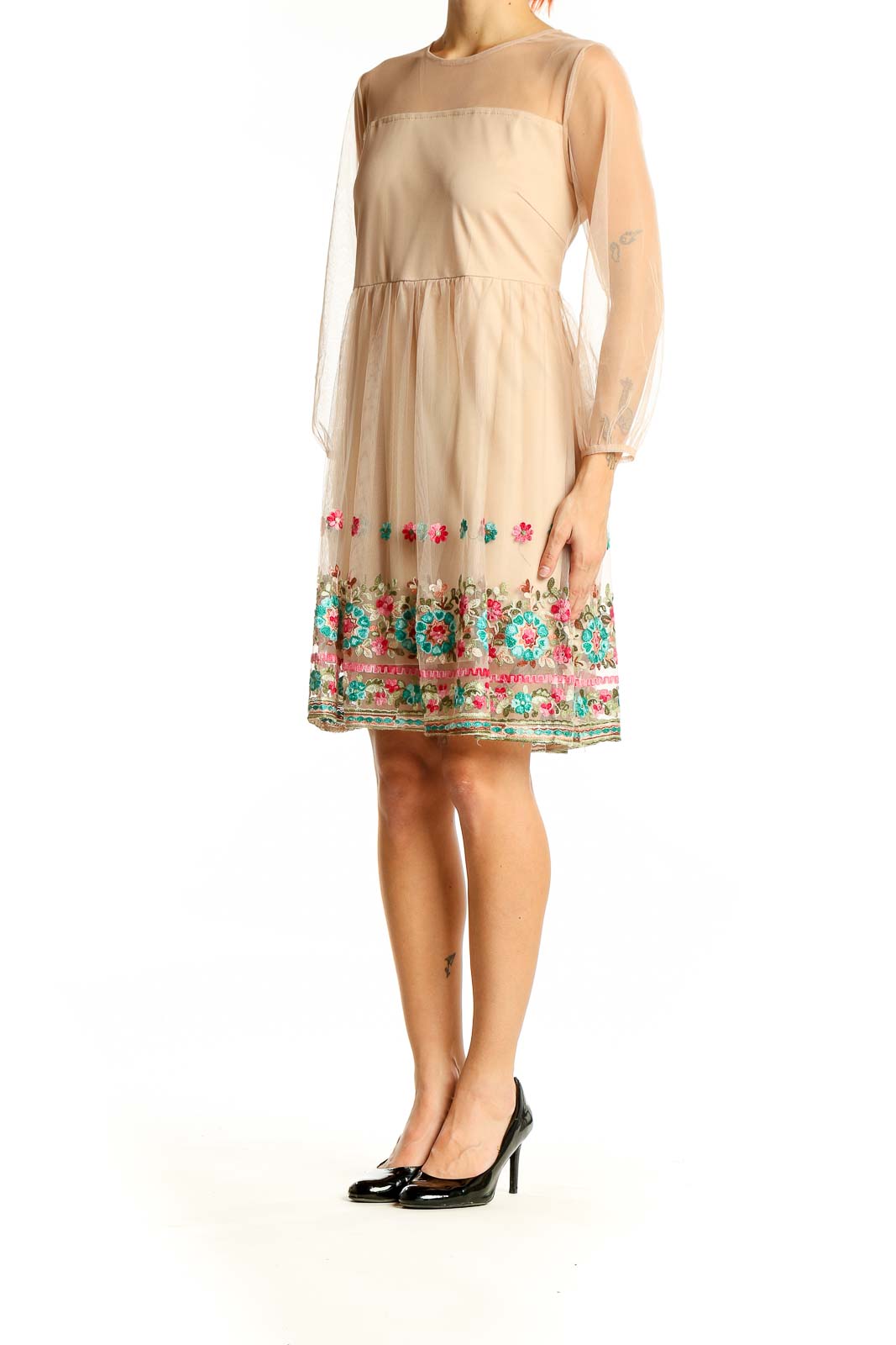 Front view of Entro beige dress with sheer overlay and floral embroidery