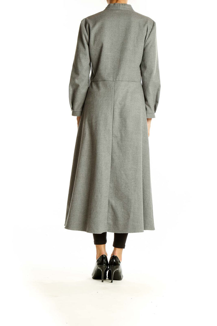 Side view of gray Zara Woman V-neck midi dress showing full length