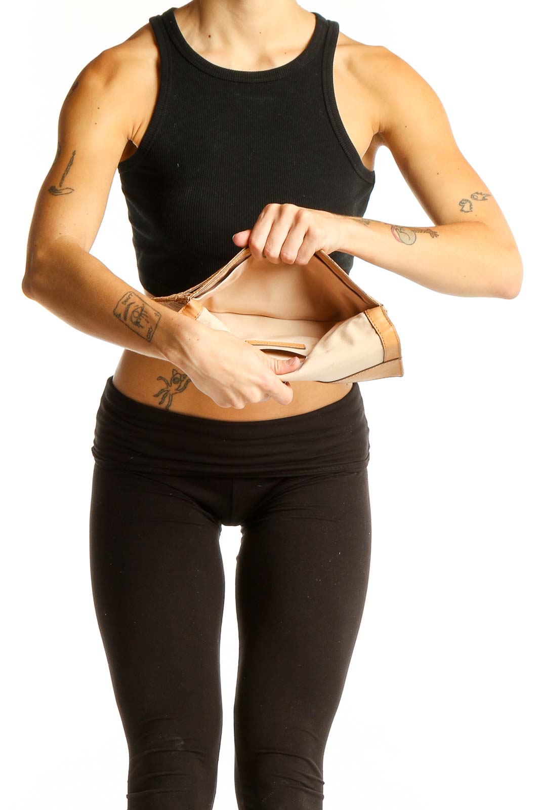 Person holding cork clutch showing size and proportion