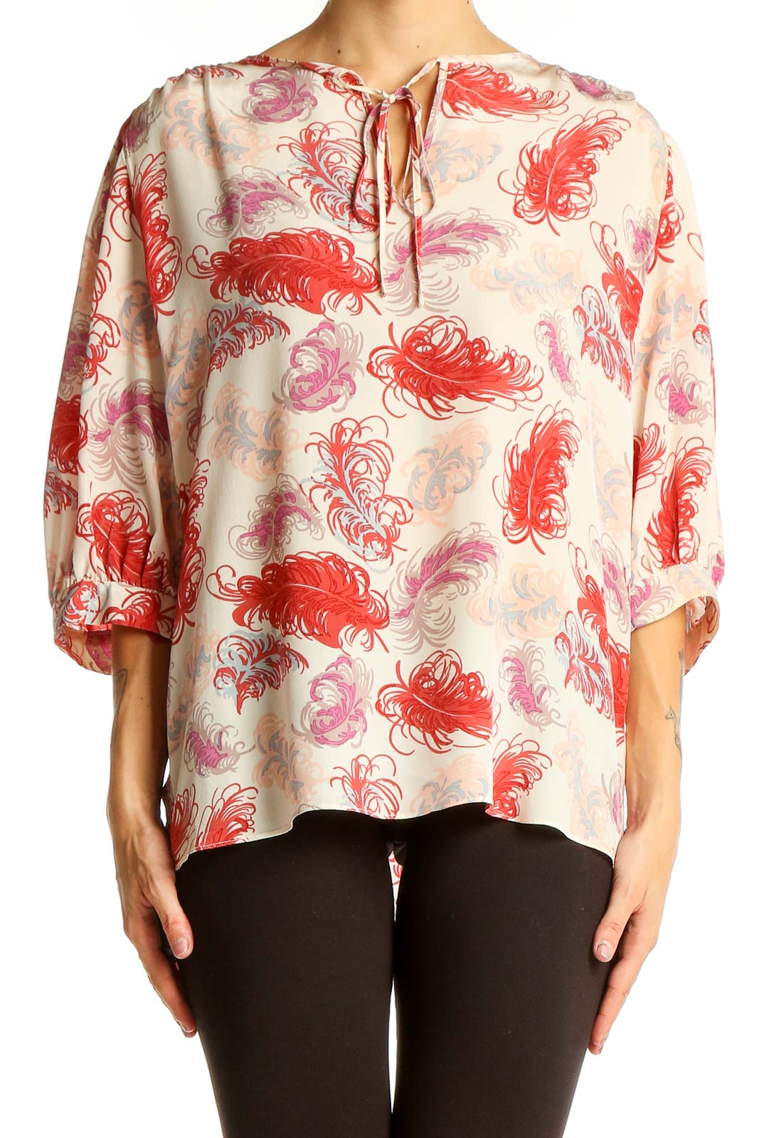 Front view of Tucker red feather print silk blouse with tie neckline