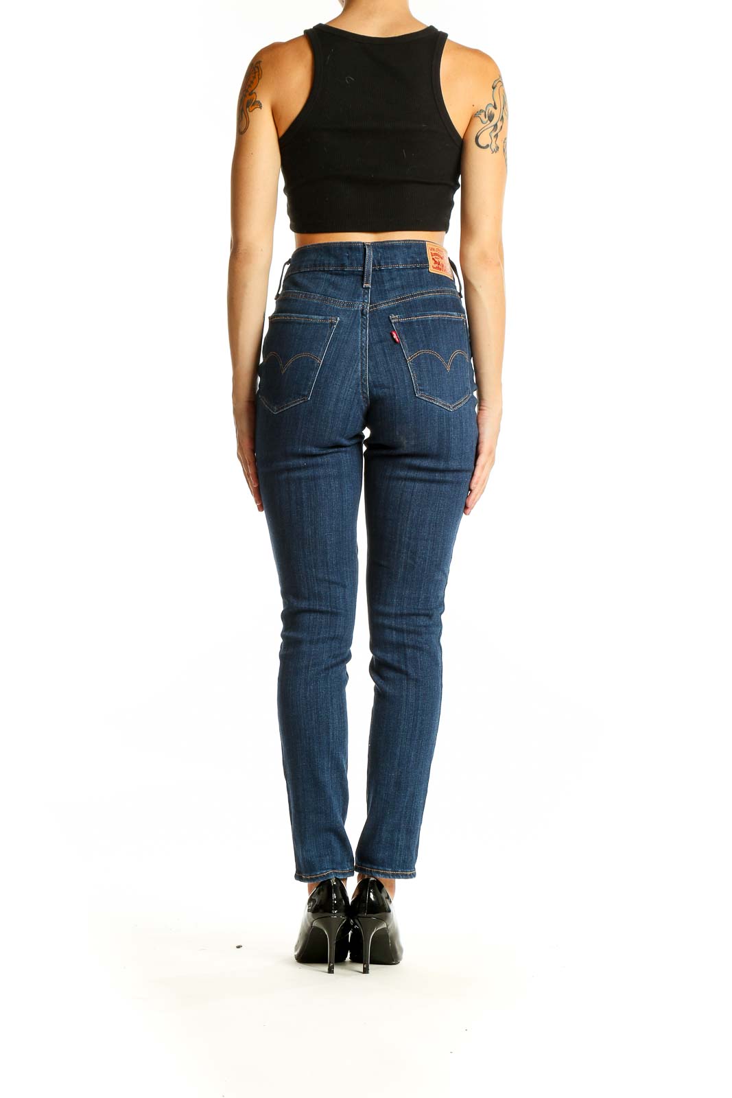 Back view of Levi's blue skinny jeans showing pocket design