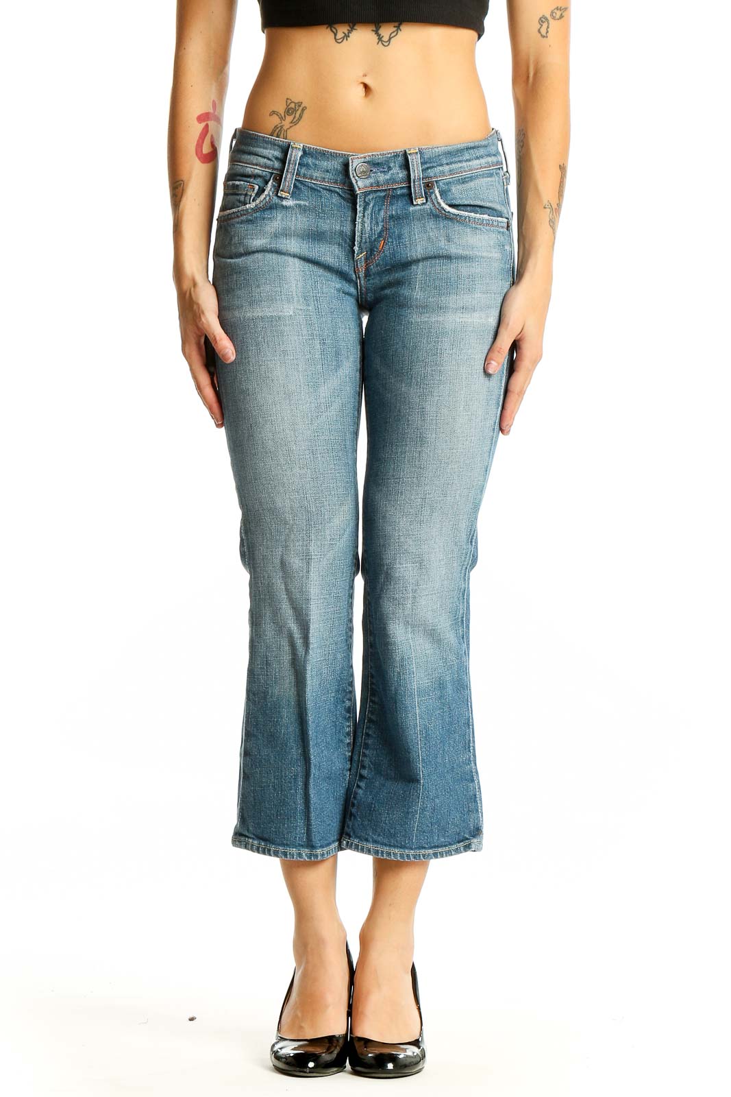 Front view of Citizens of Humanity light blue cropped flare jeans on model