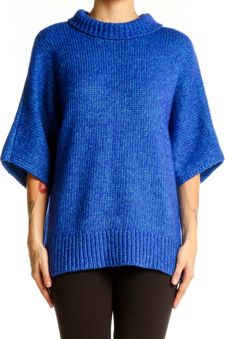 Front view of blue oversized knit sweater from Club Monaco