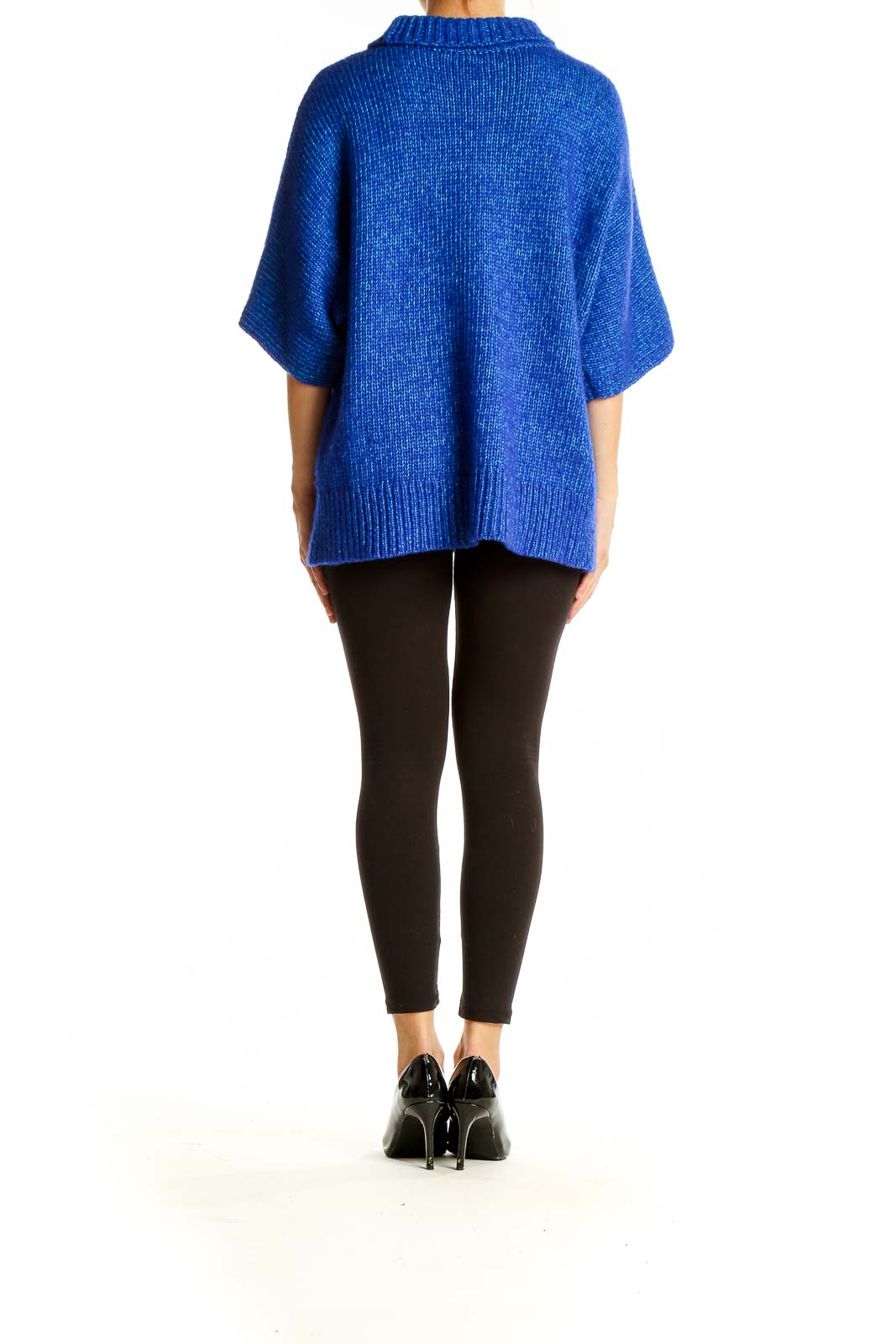 Back view of blue oversized knit sweater from Club Monaco with model