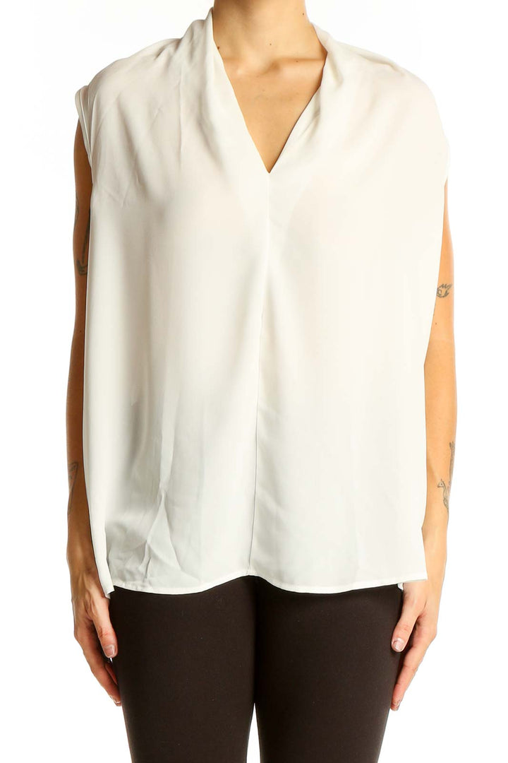 Front view of white sleeveless V-neck blouse by Renee C.