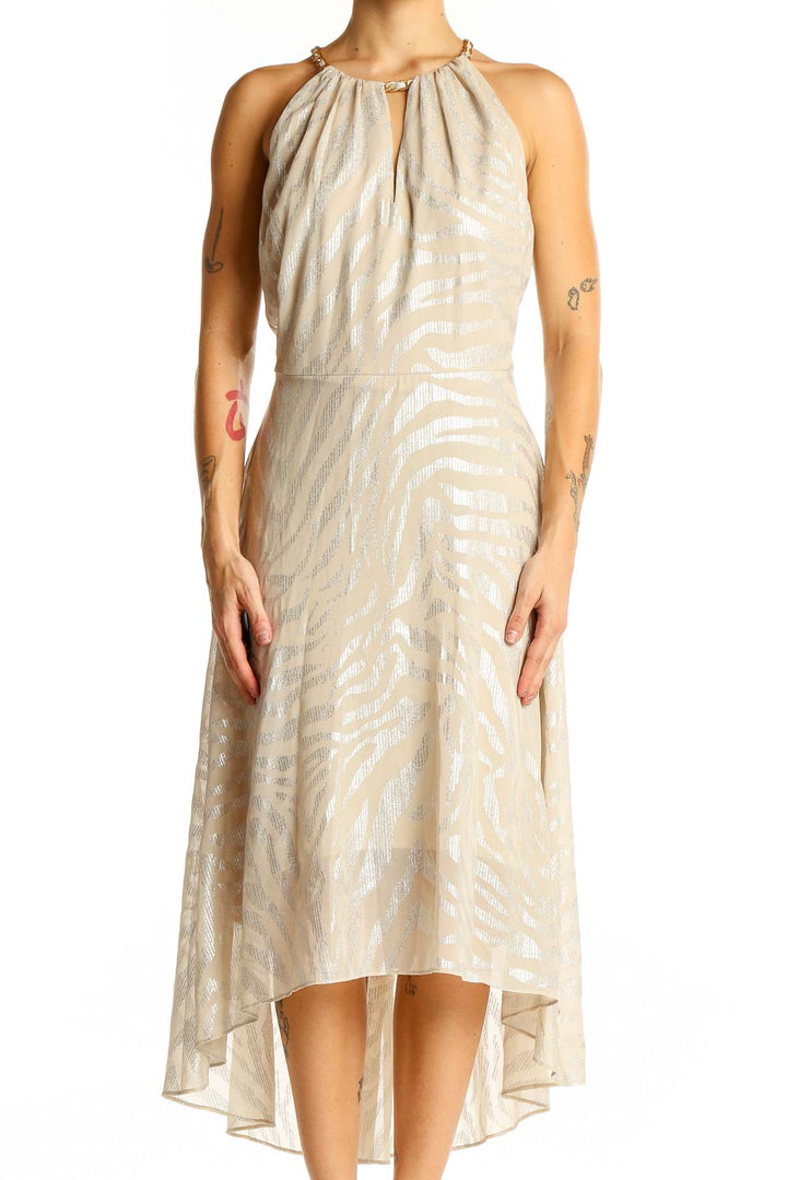 Front view of beige metallic halter neck midi dress from White House Black Market