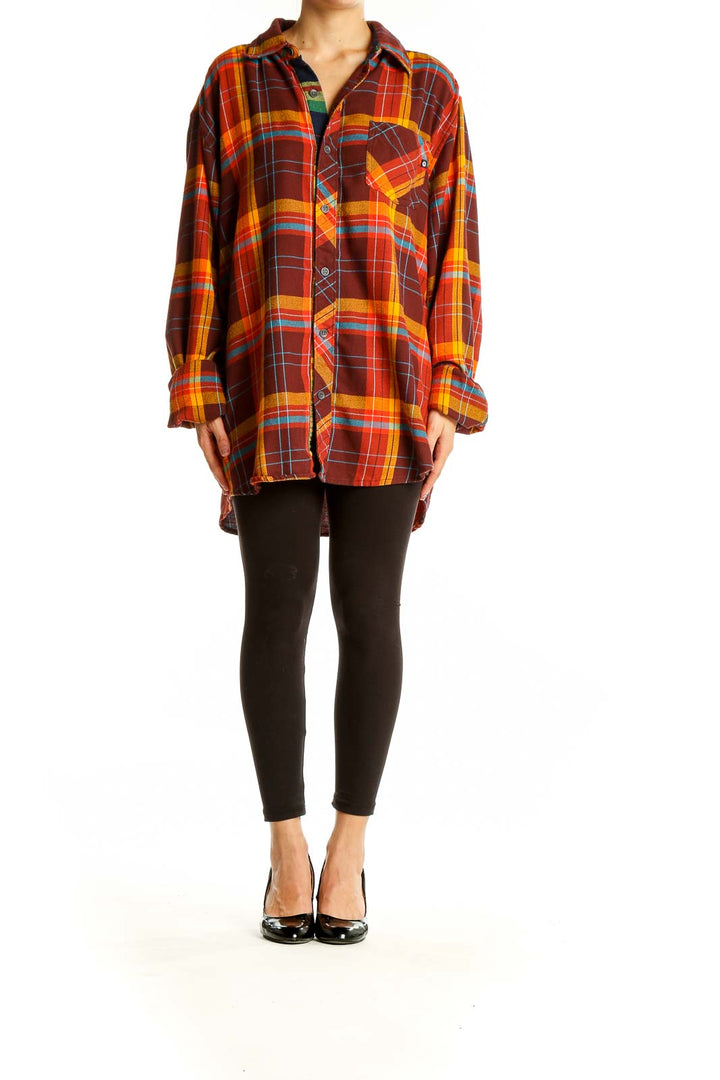 Front view of Marmot orange plaid oversized button-down shirt