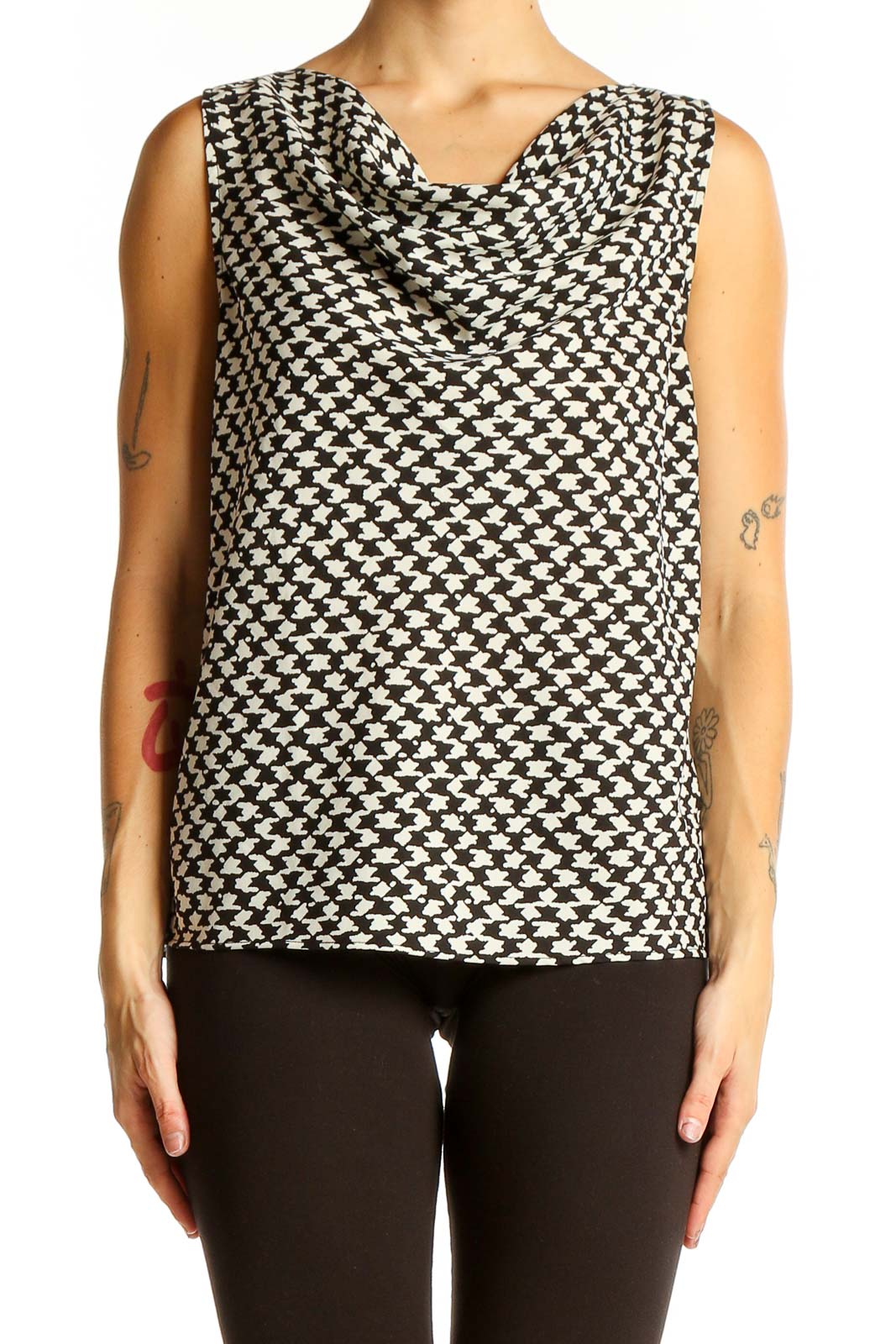 Front view of Ann Taylor LOFT Petites black and white houndstooth sleeveless blouse with cowl neck