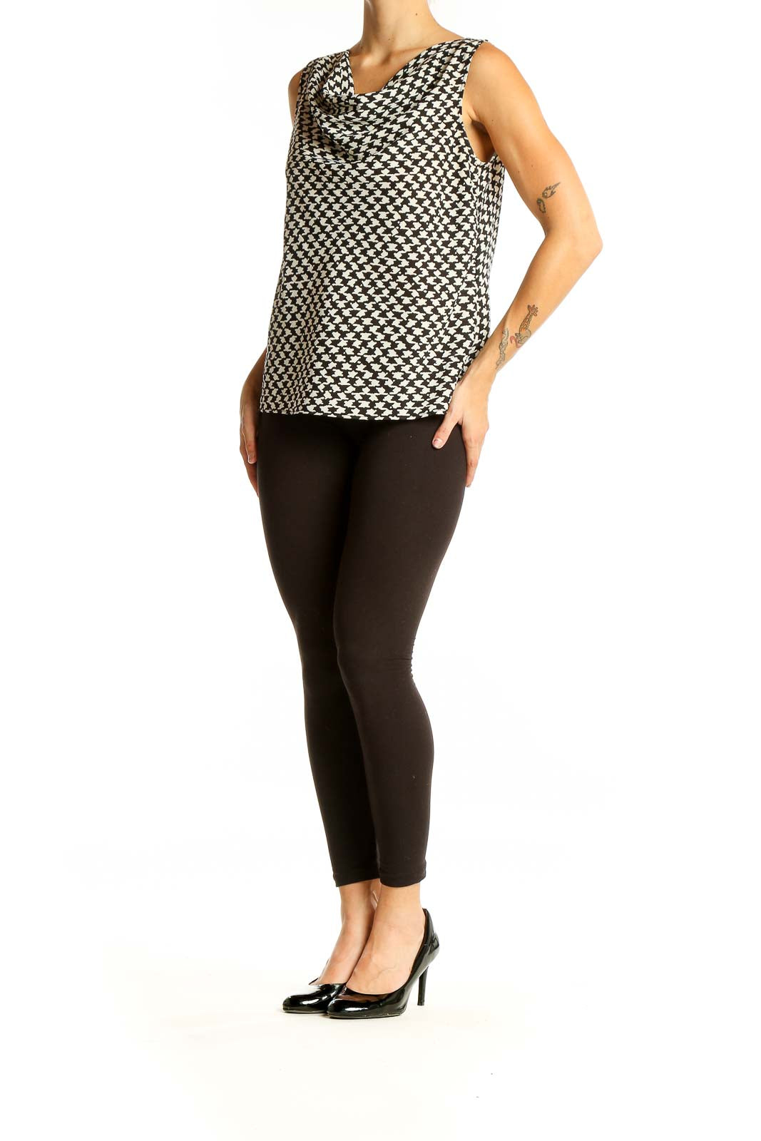 Front view of Ann Taylor LOFT Petites black and white houndstooth sleeveless blouse with cowl neck