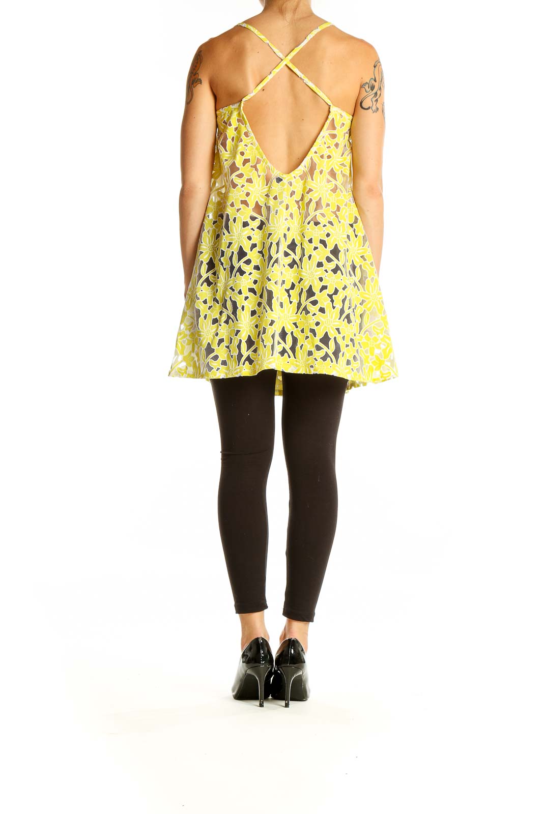 Back view of yellow floral lace swing cami top from ASOS showing criss-cross straps