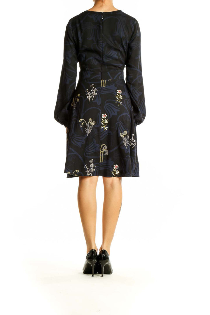 Back view of Ann Taylor LOFT navy dress showing floral embroidery pattern