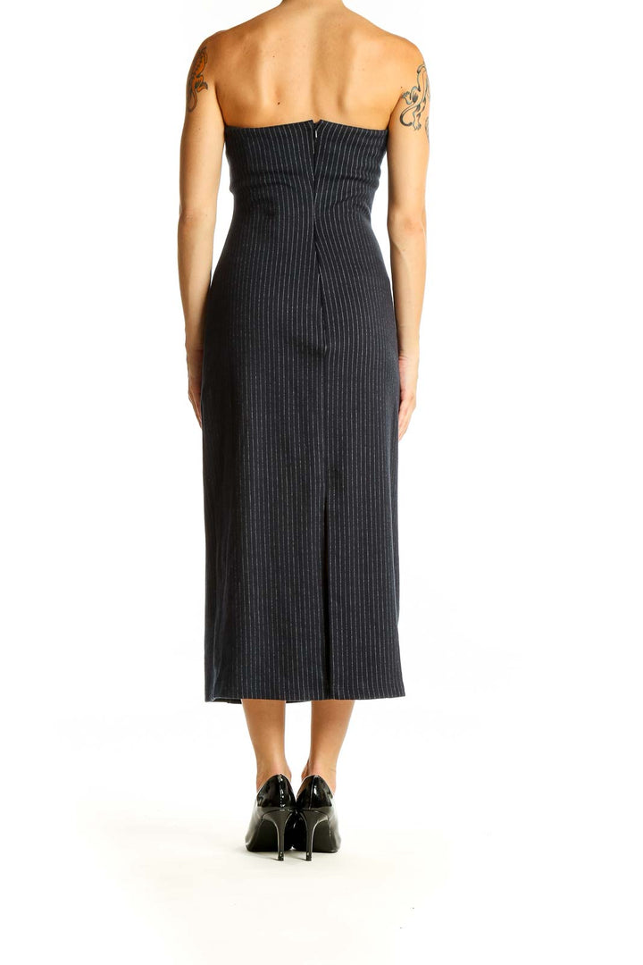 Back view of Anthropologie charcoal pinstripe strapless midi dress