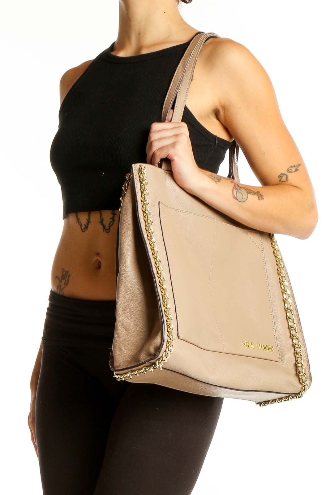 Front view of Steve Madden beige tote bag with gold chain accents