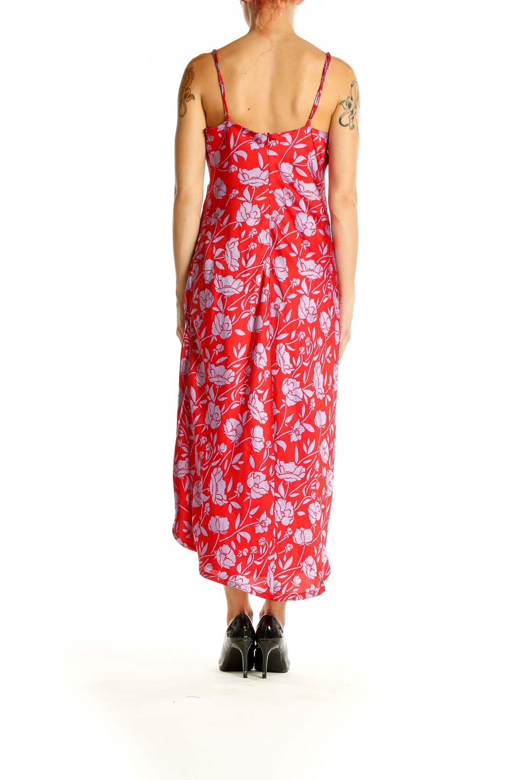 Back view of red floral print midi dress showing open back design