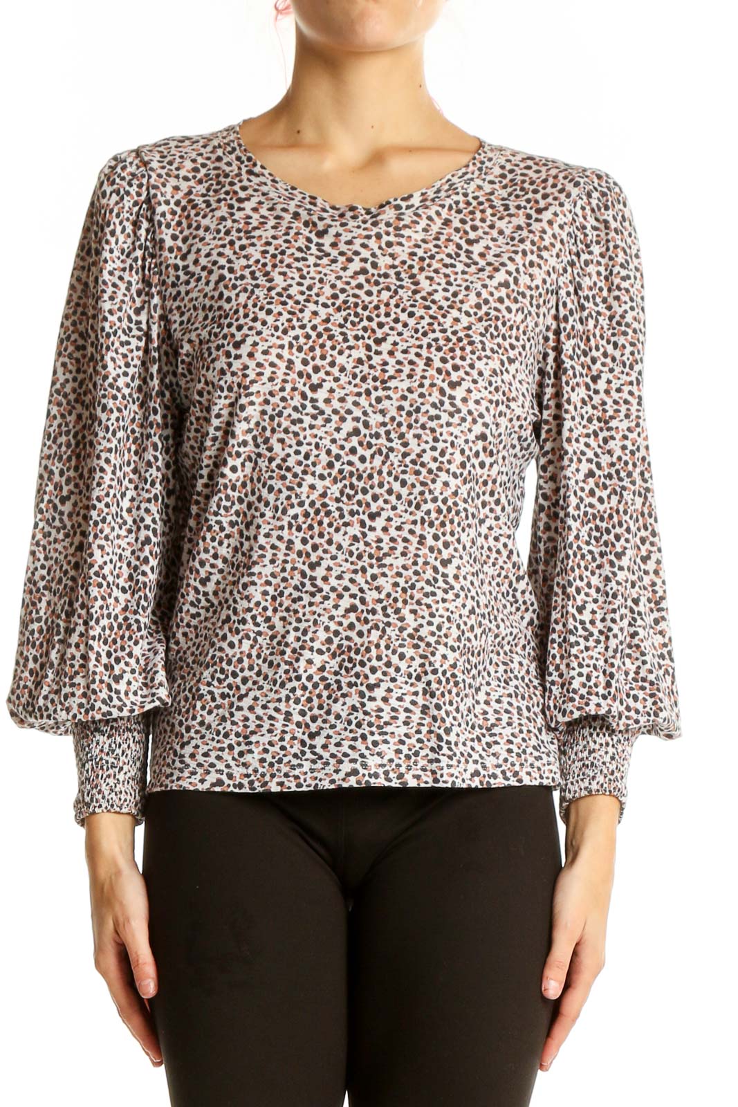 Front view of Nation LTD beige leopard print top with puff sleeves