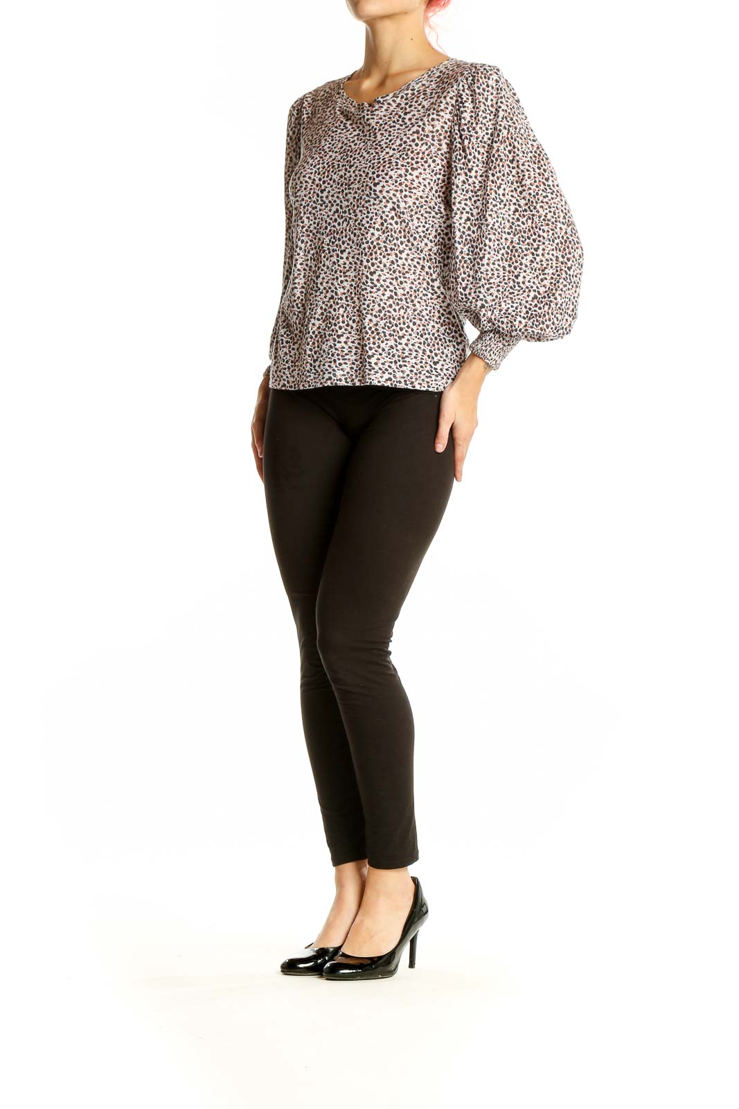 Front view of Nation LTD beige leopard print top with puff sleeves